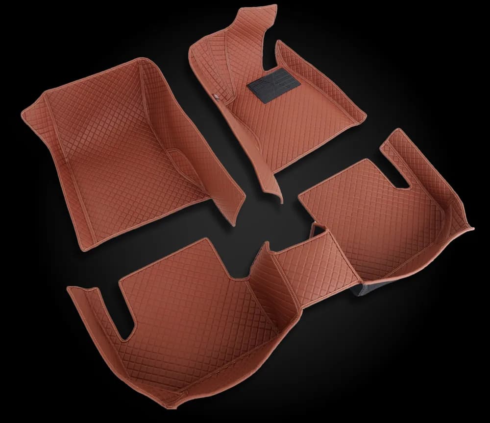 Complete CNC-cut set of tan 3D car mats, front and rear pieces