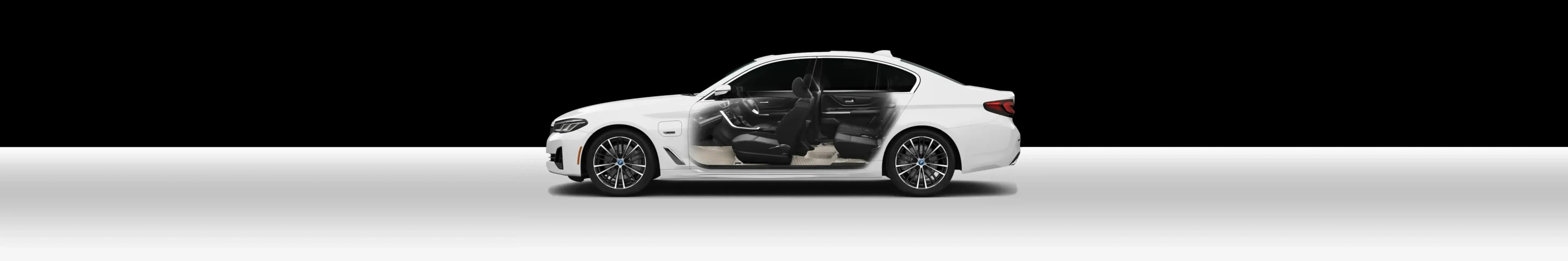 Cut-away of a white sedan showing 3D car mats on every footwell and in the boot