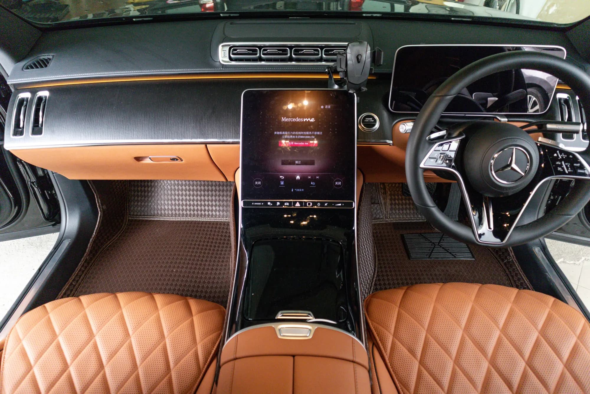 Mercedes S-Class dashboard and front row with brown 3D car mats