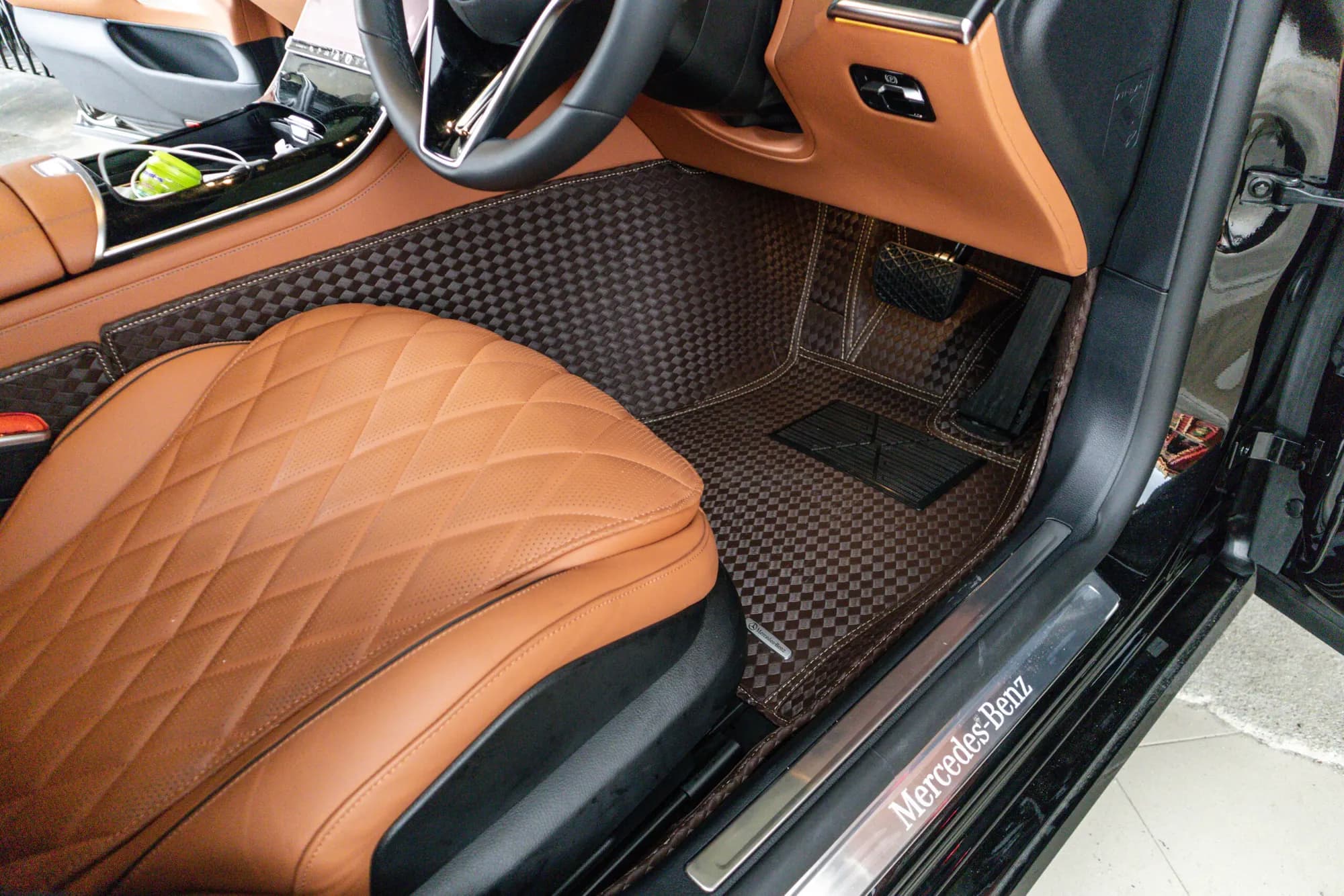 Mercedes S-Class passenger footwell with a brown 3D car mat