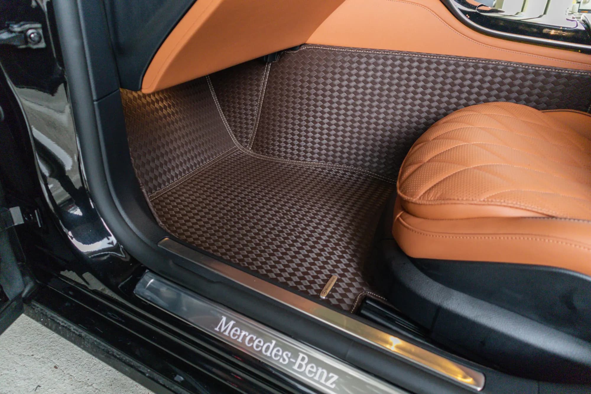 Mercedes S-Class rear footwell with a brown 3D car mat