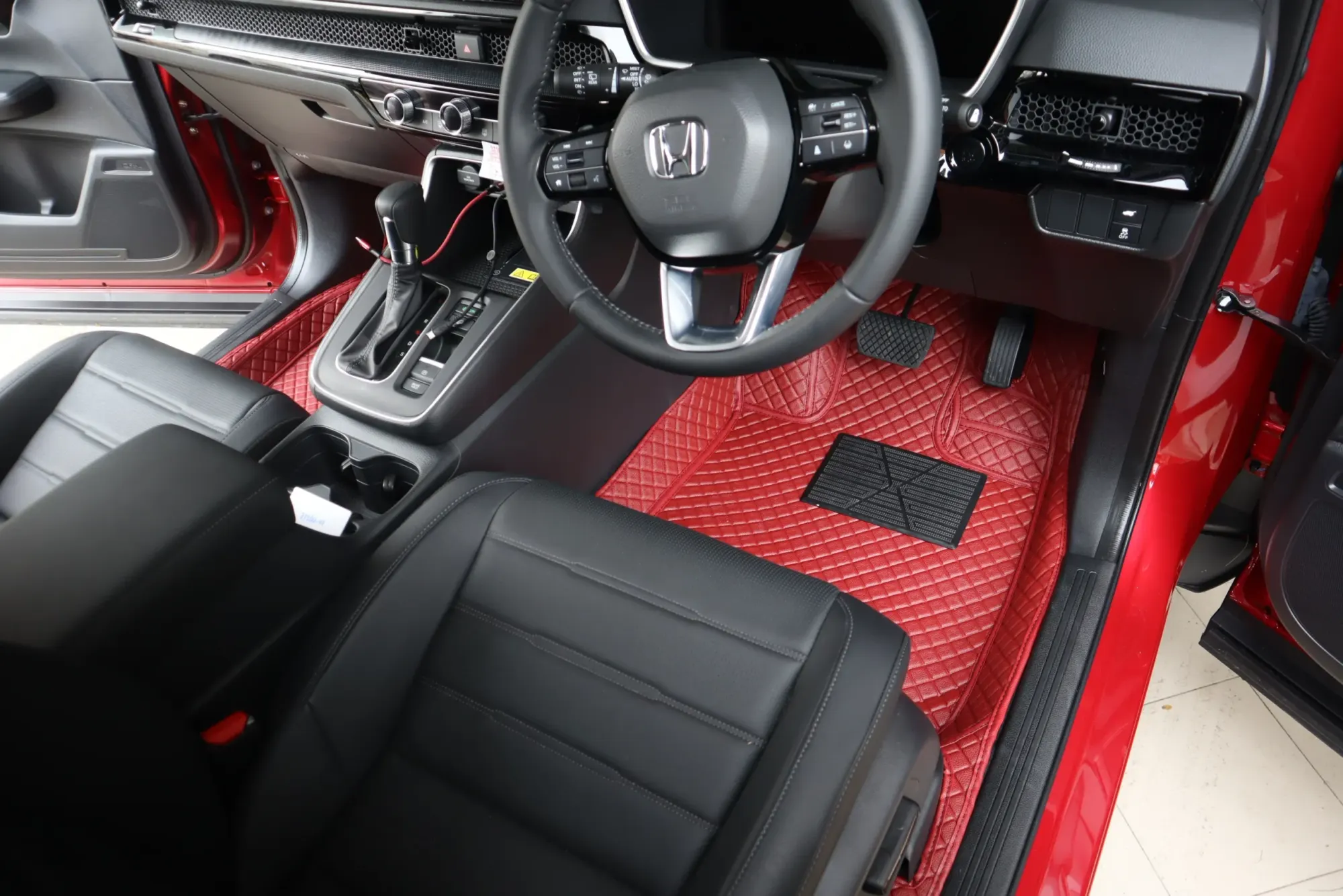 Red SUV front row with red 3D car mats