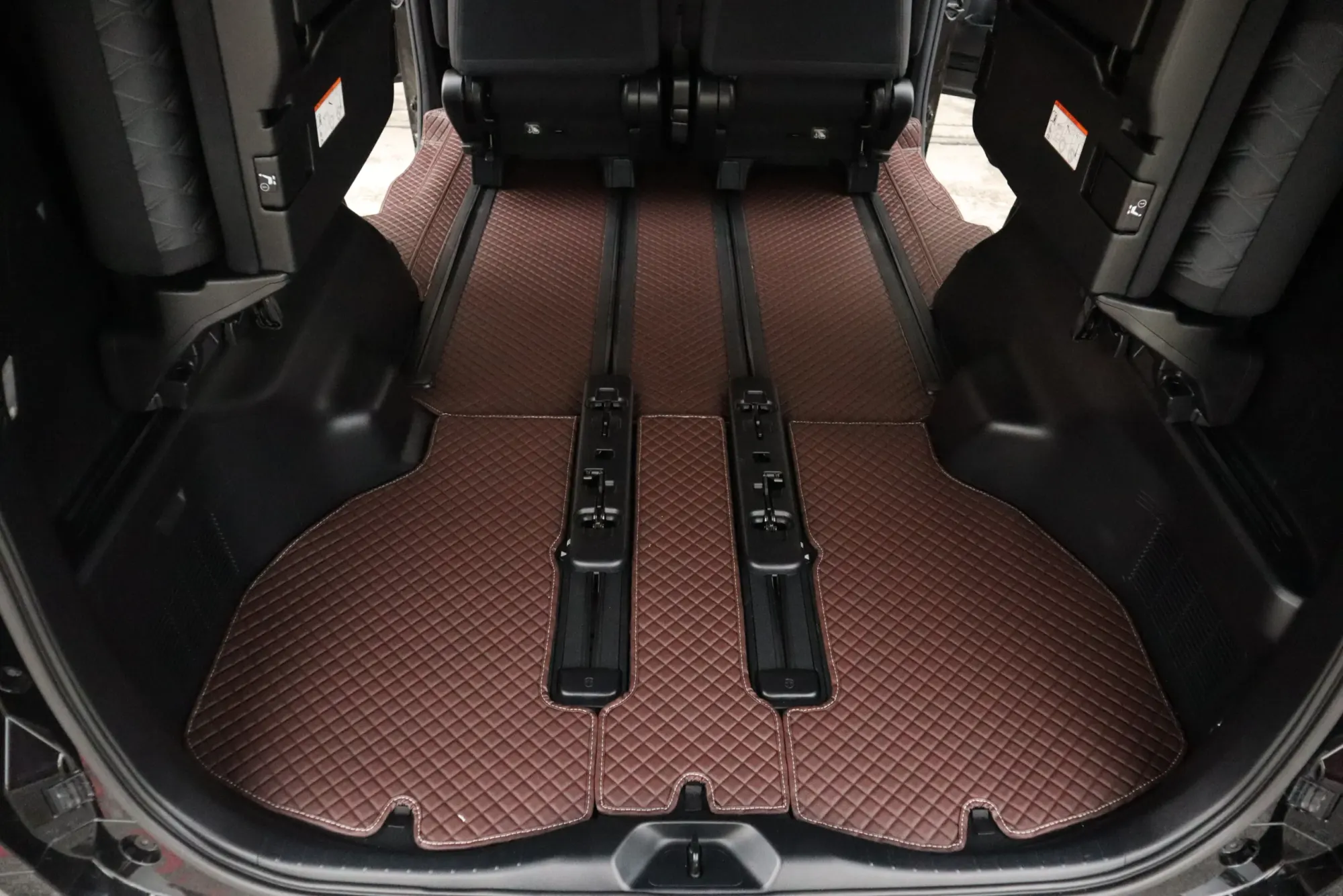 MPV rear floor and rails with brown 3D car mats