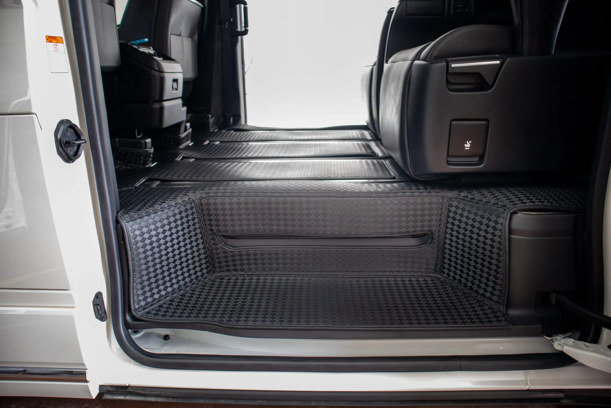 Large MPV floor from the sliding door with black 3D car mats