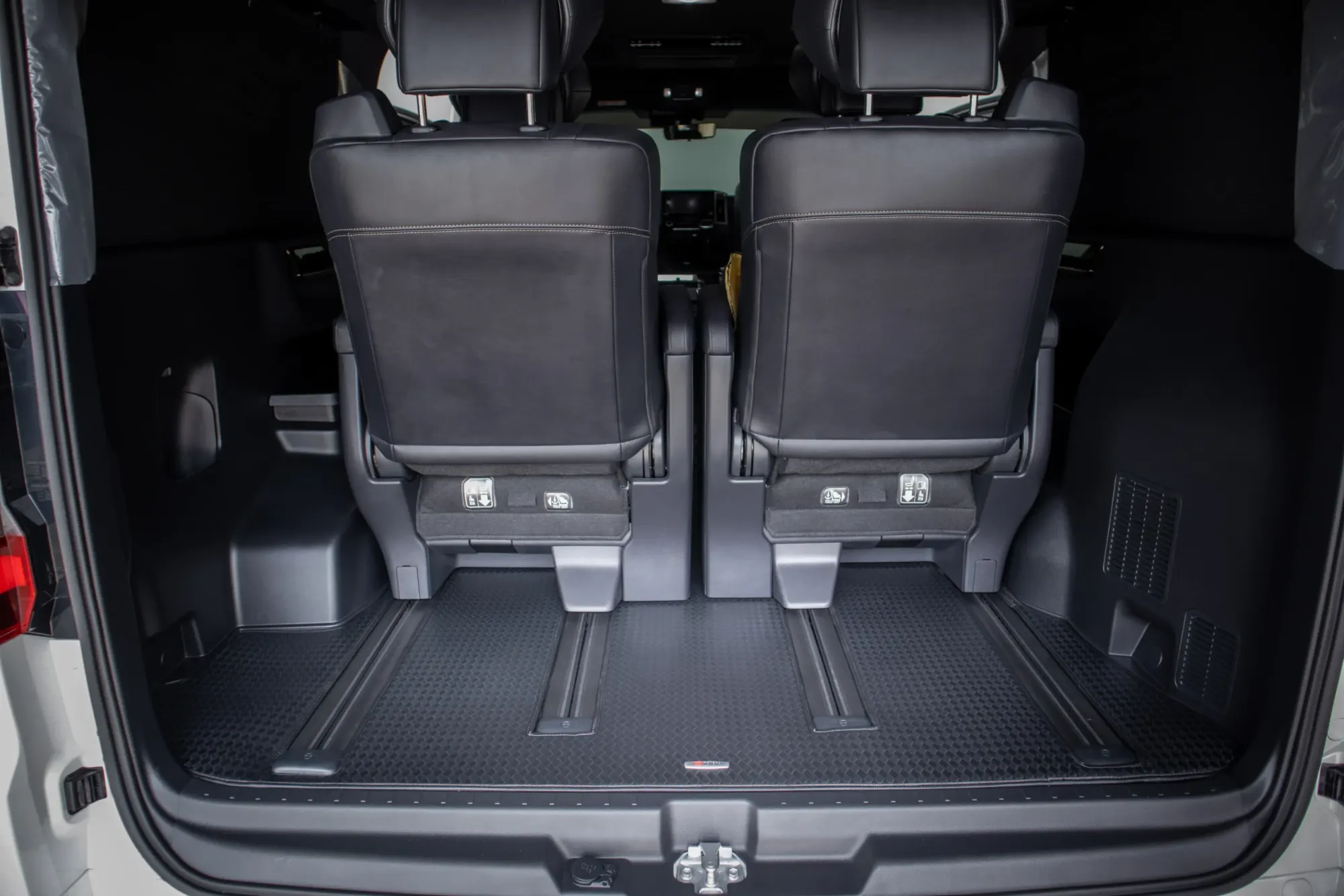 Large MPV boot and rear seats with black 3D mats