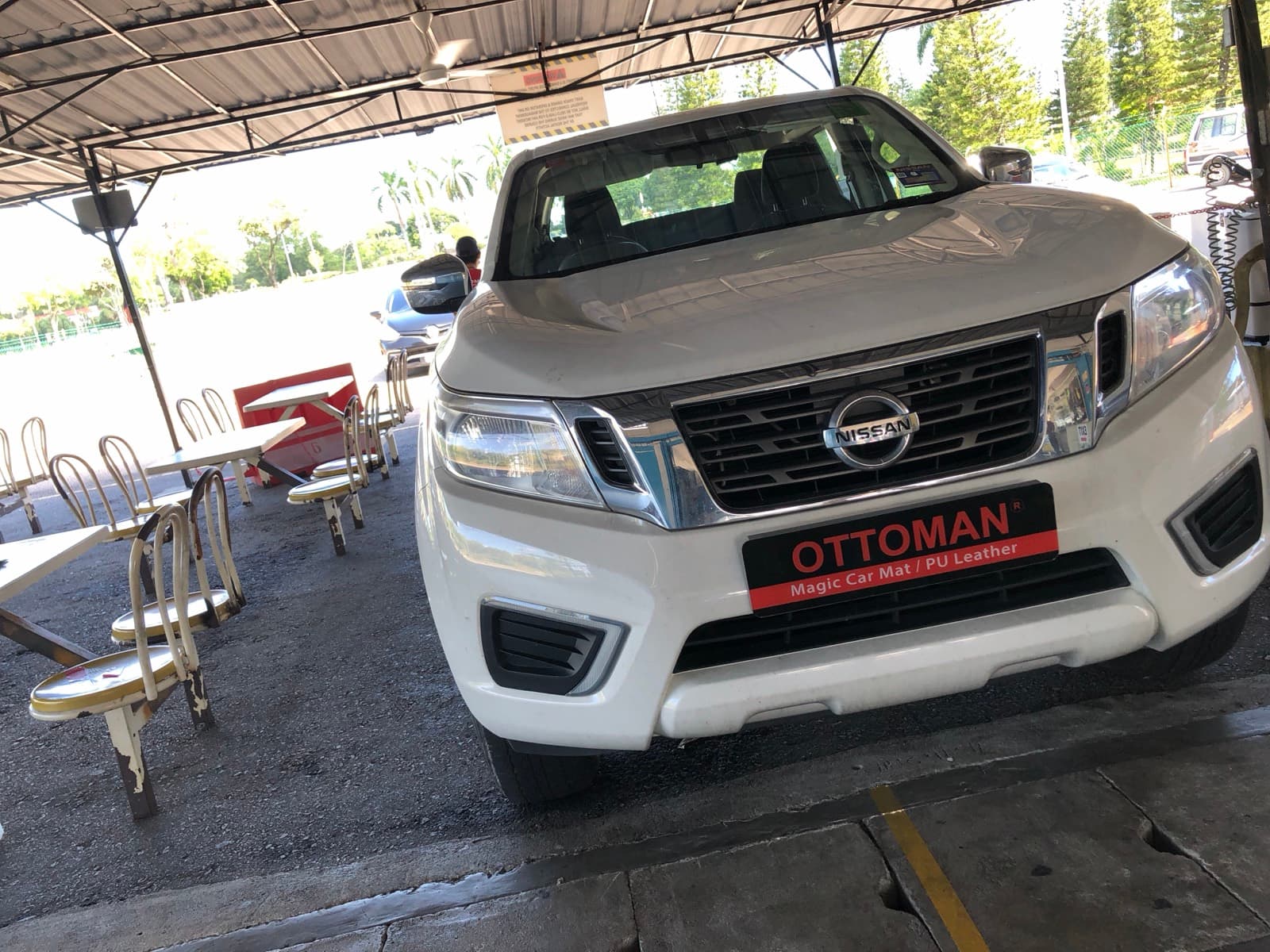 Nissan Navara with Ottoman custom-fit seat covers and 3D car mats