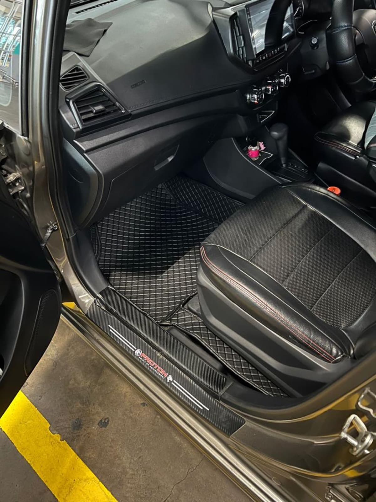 Proton Iriz with Ottoman custom-fit seat covers and 3D car mats