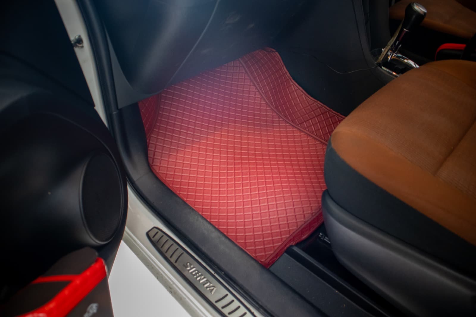 Toyota Sienta with Ottoman custom-fit seat covers and 3D car mats