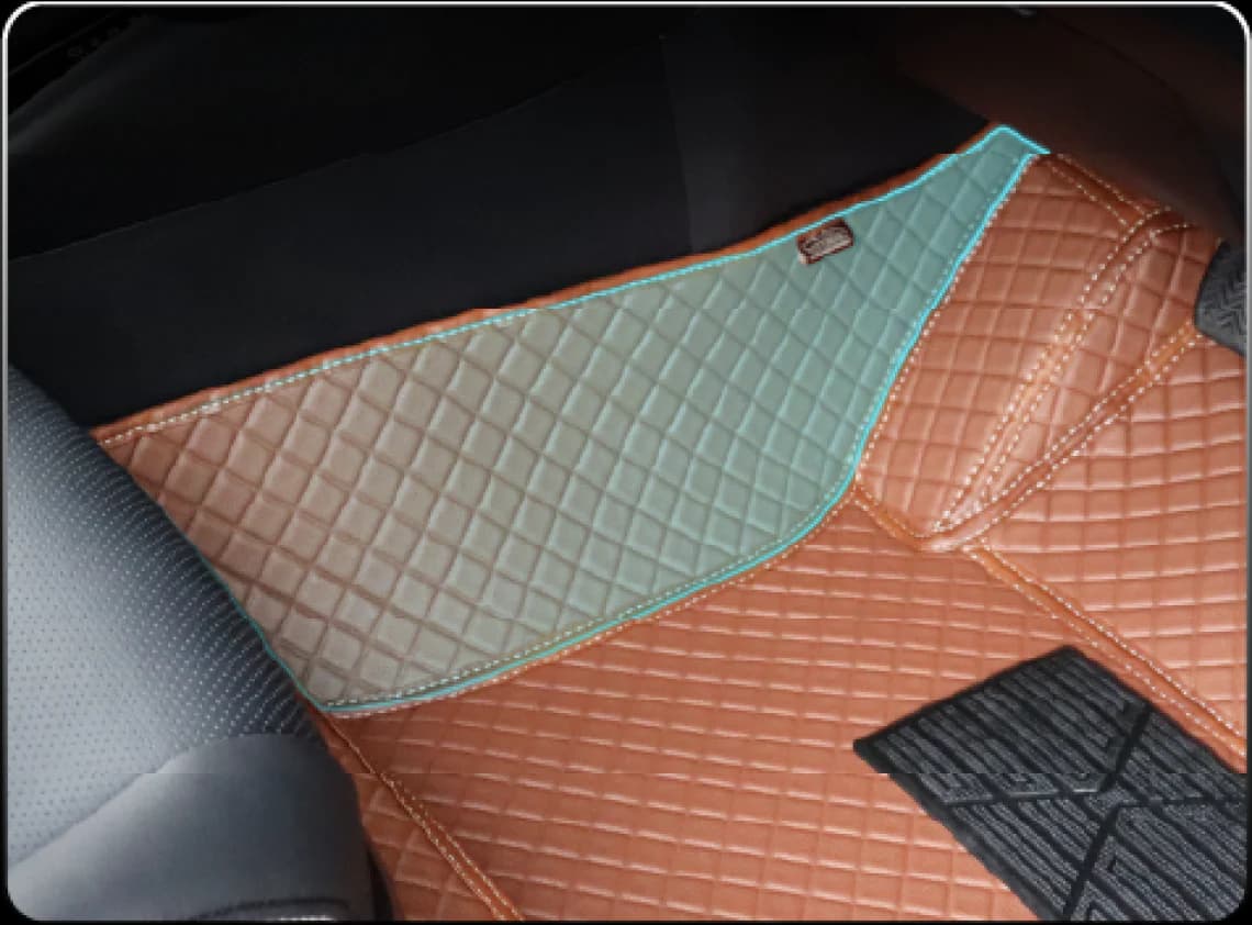 Passenger side wall covered edge to edge by a 3D mat