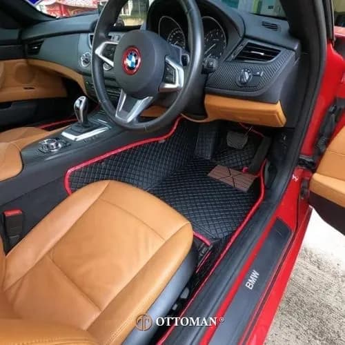 BMW Z4 driver's side with a black 3D car mat