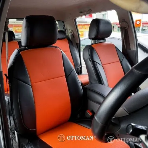 Toyota Hilux fitted with Orange & Black seat covers